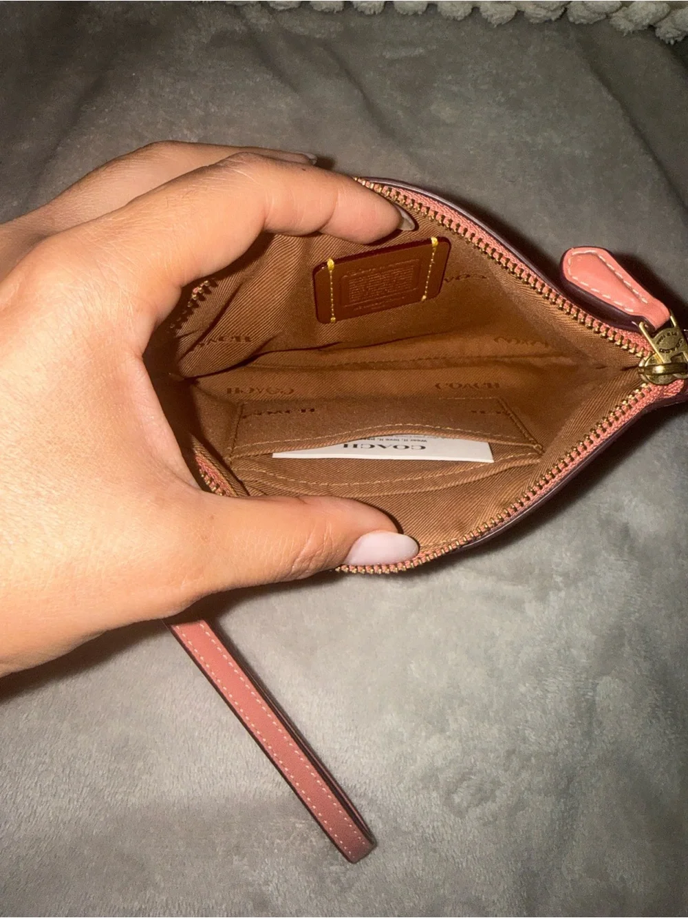 COACH x DISNEY Daisy Leather Wristlet Pouch in Coral Pink